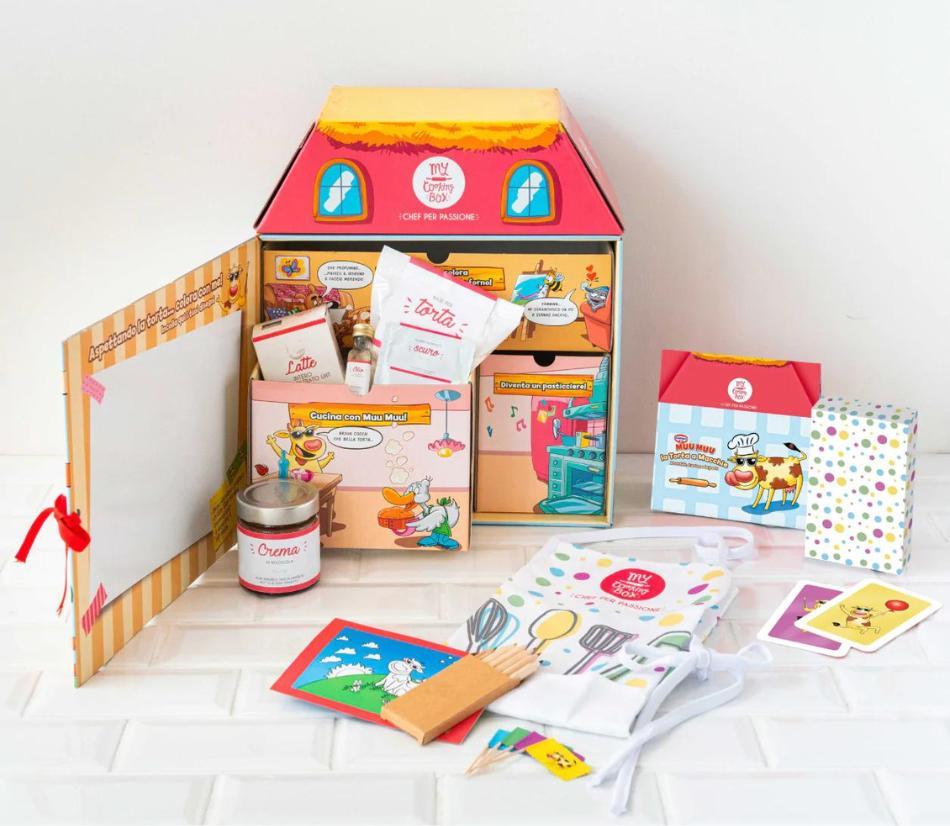 Box con ingredienti predosati per preparare una torta con grembiule e gioco